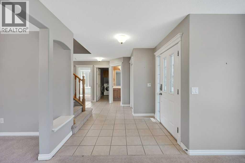 8 Valley Creek Crescent NW, Calgary, Alberta  T3B 5V2 - Photo 3 - A2310883