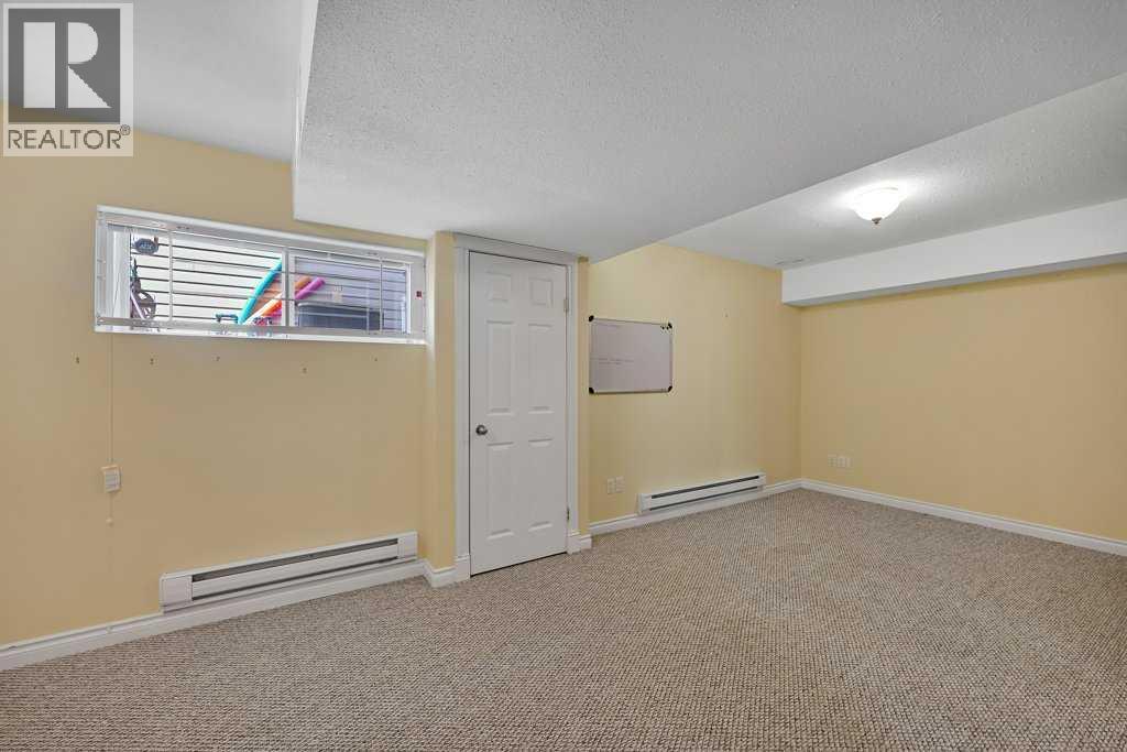 8 Valley Creek Crescent NW, Calgary, Alberta  T3B 5V2 - Photo 33 - A2310883