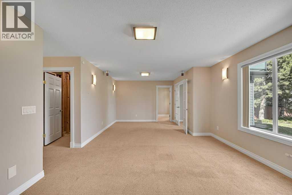 8 Valley Creek Crescent NW, Calgary, Alberta  T3B 5V2 - Photo 39 - A2310883