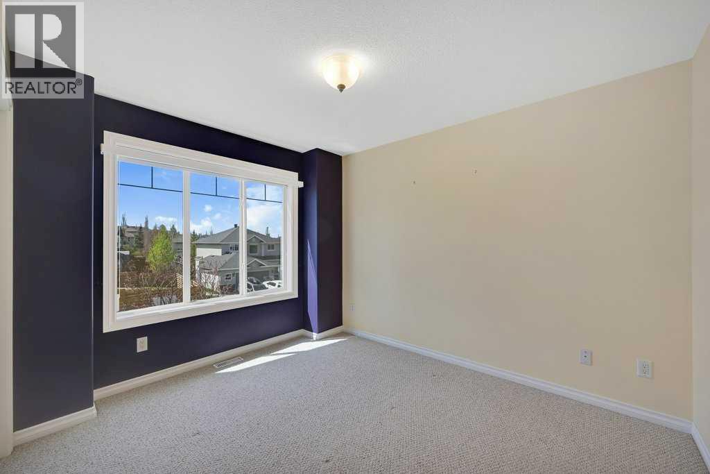 8 Valley Creek Crescent NW, Calgary, Alberta  T3B 5V2 - Photo 28 - A2310883