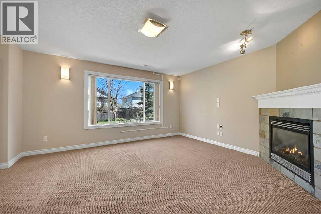 8 Valley Creek Crescent NW, Calgary, Alberta  T3B 5V2 - Photo 37 - A2310883