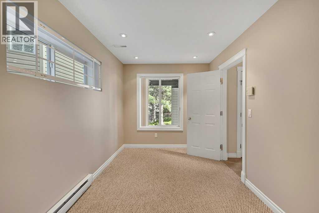 8 Valley Creek Crescent NW, Calgary, Alberta  T3B 5V2 - Photo 40 - A2310883