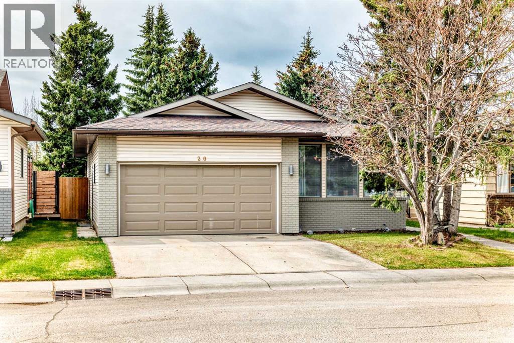 20 Woodbrook Close SW, Calgary, Alberta  T2W 4E9 - Photo 1 - A2301228