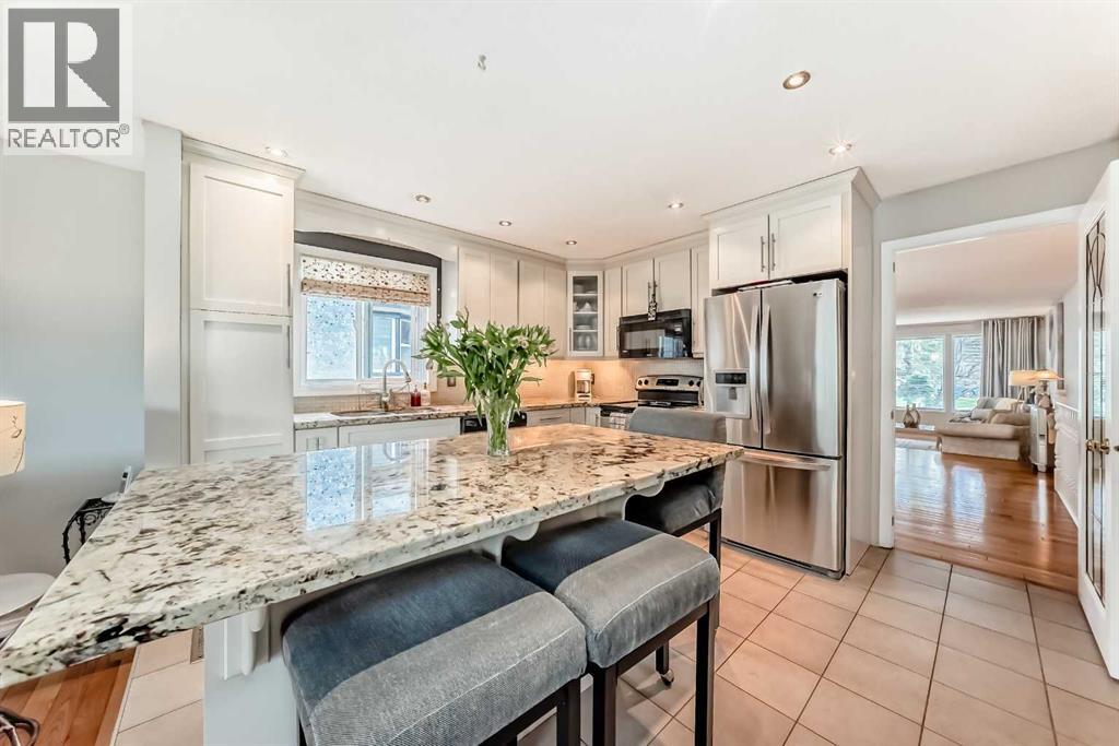 20 Woodbrook Close SW, Calgary, Alberta  T2W 4E9 - Photo 4 - A2301228