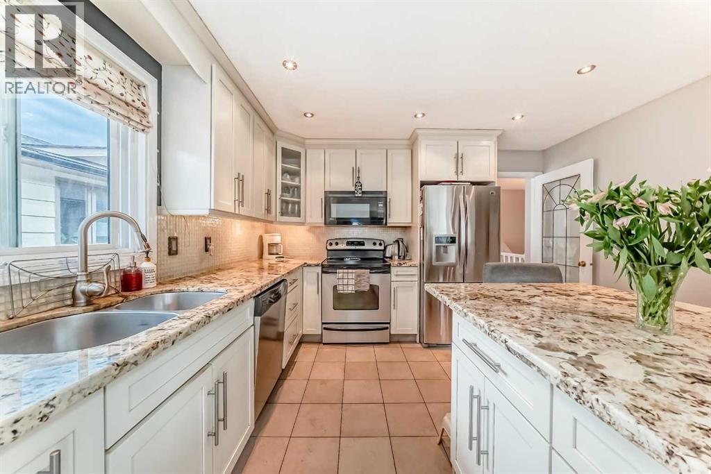 20 Woodbrook Close SW, Calgary, Alberta  T2W 4E9 - Photo 5 - A2301228