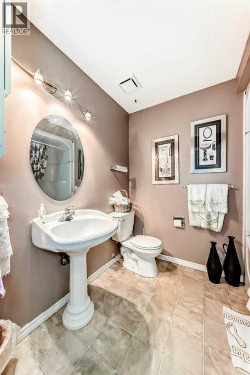 20 Woodbrook Close SW, Calgary, Alberta  T2W 4E9 - Photo 22 - A2301228