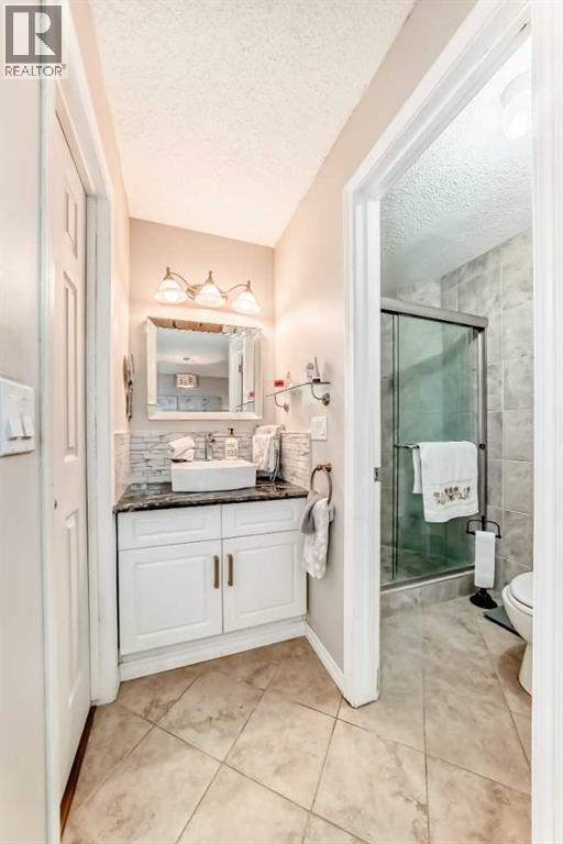 20 Woodbrook Close SW, Calgary, Alberta  T2W 4E9 - Photo 19 - A2301228