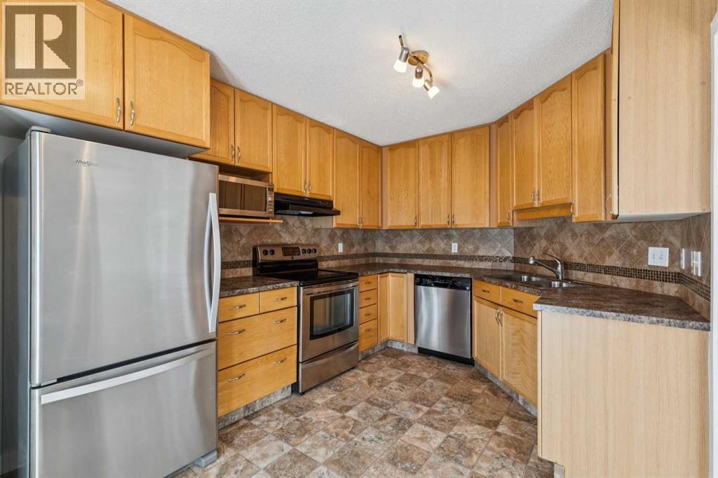 1213, 1213 Sienna Park Green Sw, Calgary, Alberta  T3H 3N7 - Photo 14 - A2310946