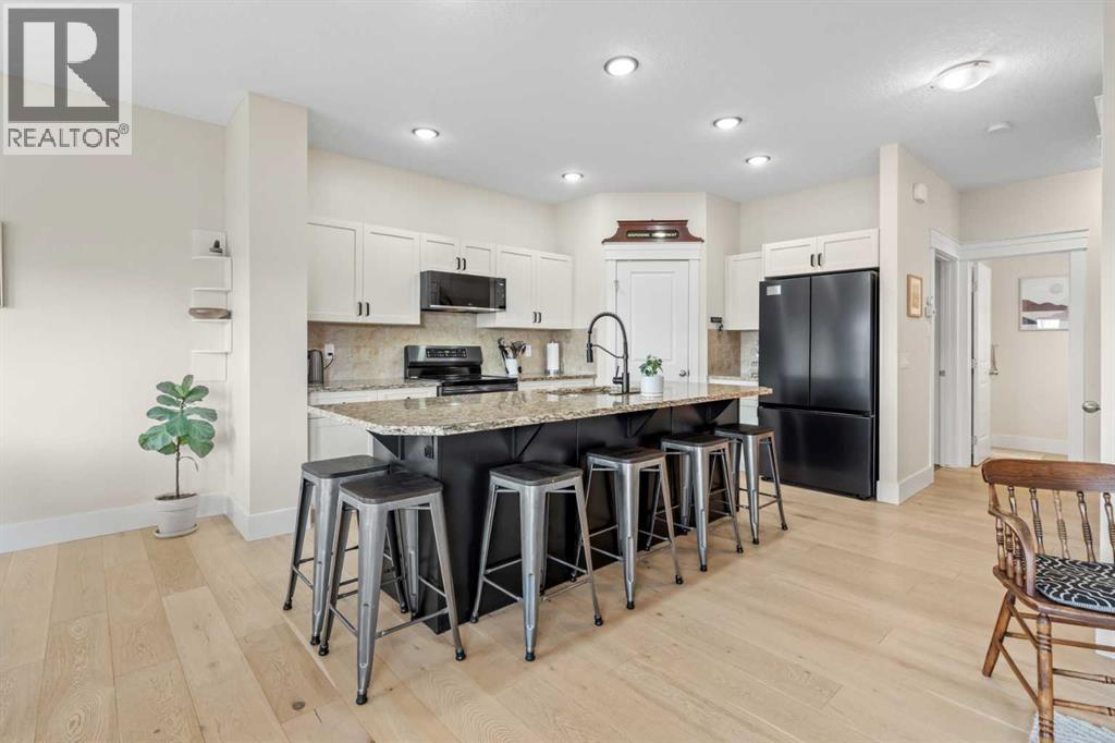 10 Heritage View, Cochrane, Alberta  T4C 0E4 - Photo 7 - A2309835