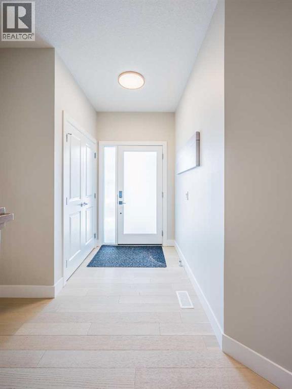 57 Westmore Park Sw, Calgary, Alberta  T3H 6A9 - Photo 3 - A2311891