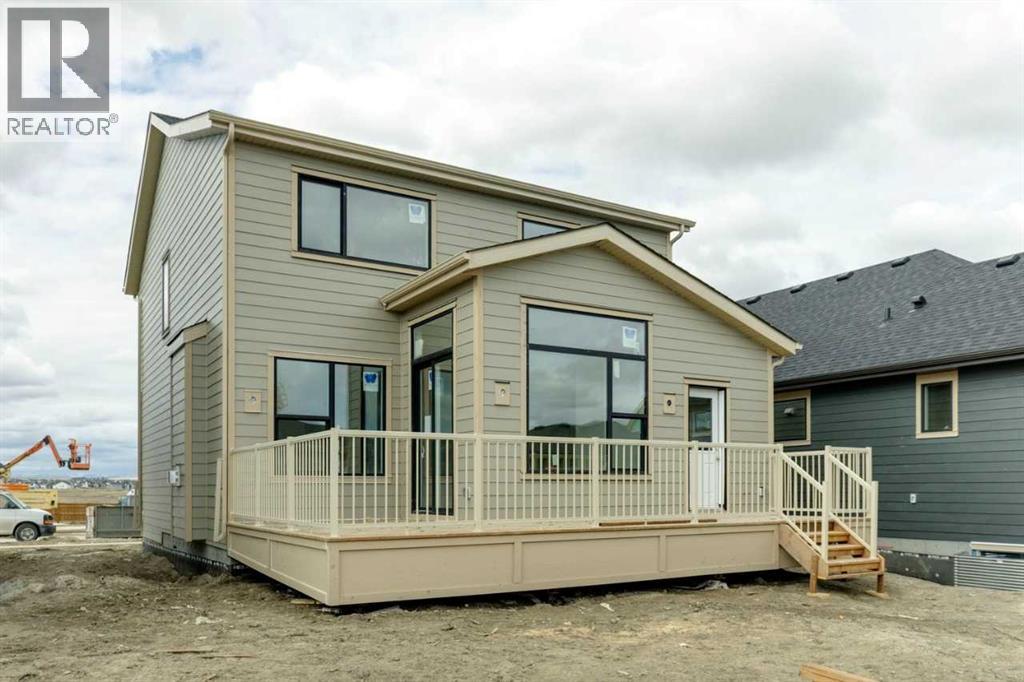 242 Harmony Circle, Rural Rocky View County, Alberta  T3Z 0K9 - Photo 7 - A2302929