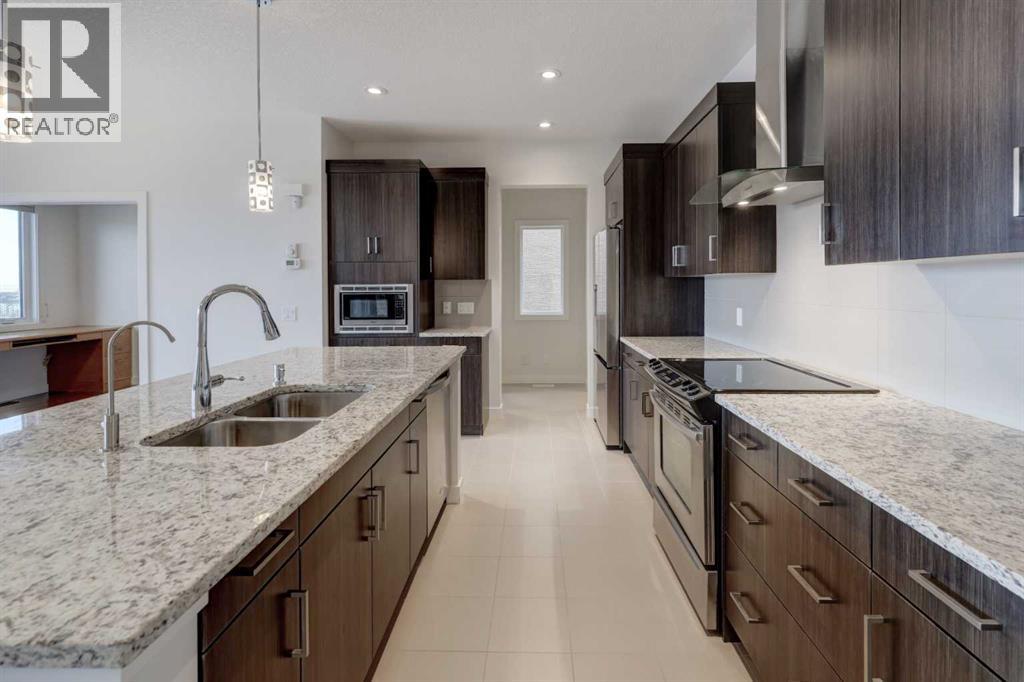 83 Evansridge View NW, Calgary, Alberta  T3P 0H3 - Photo 5 - A2306677