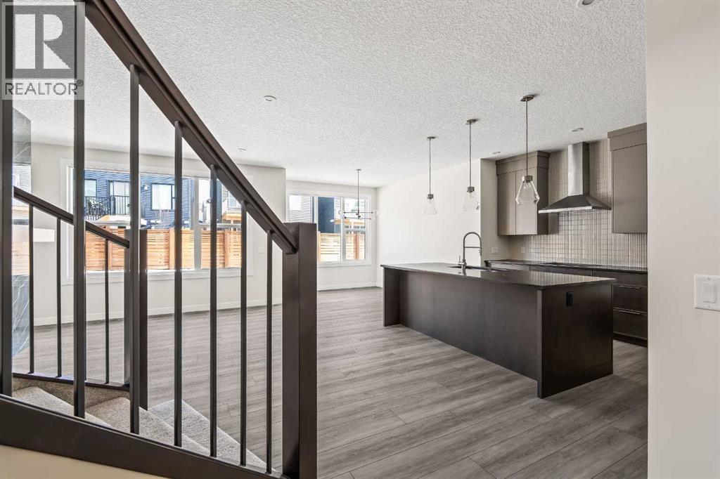 506 Lucas Way NW, Calgary, Alberta  T3P 2E7 - Photo 2 - A2307462