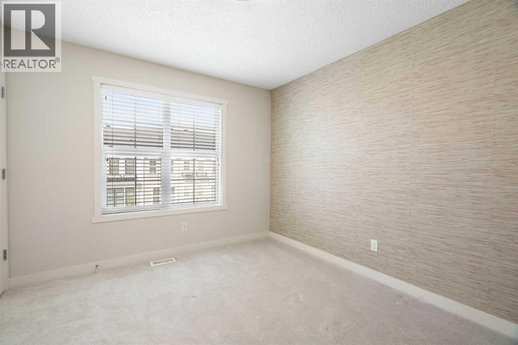 404 Nolanfield Villas NW, Calgary, Alberta  T3R 0T9 - Photo 16 - A2311082
