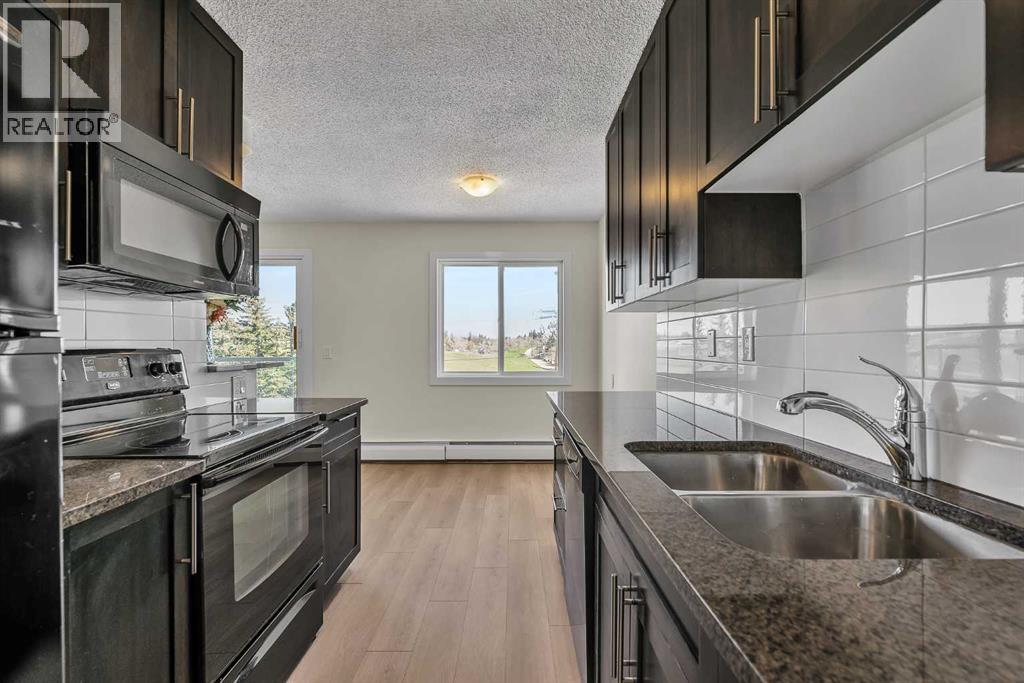 406, 4455a Greenview Drive NE, Calgary, Alberta  T2E 6M1 - Photo 7 - A2308704
