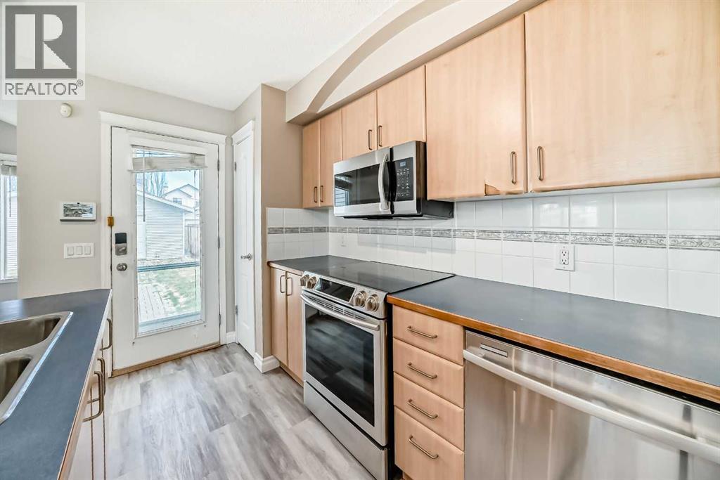 168 Tuscany Springs Way NW, Calgary, Alberta  T3L 2L5 - Photo 4 - A2308396