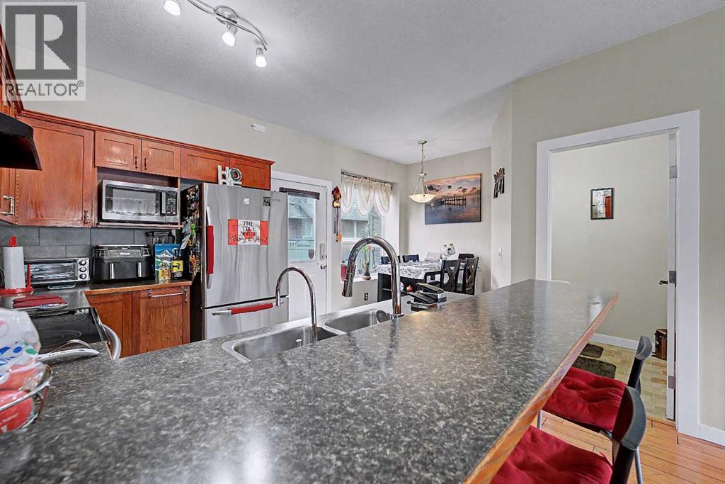 402, 2005 Luxstone Boulevard SW, Airdrie, Alberta  T4B 3J9 - Photo 8 - A2309648