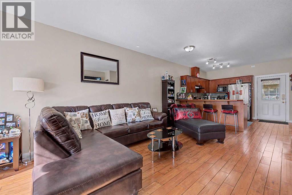 402, 2005 Luxstone Boulevard SW, Airdrie, Alberta  T4B 3J9 - Photo 1 - A2309648
