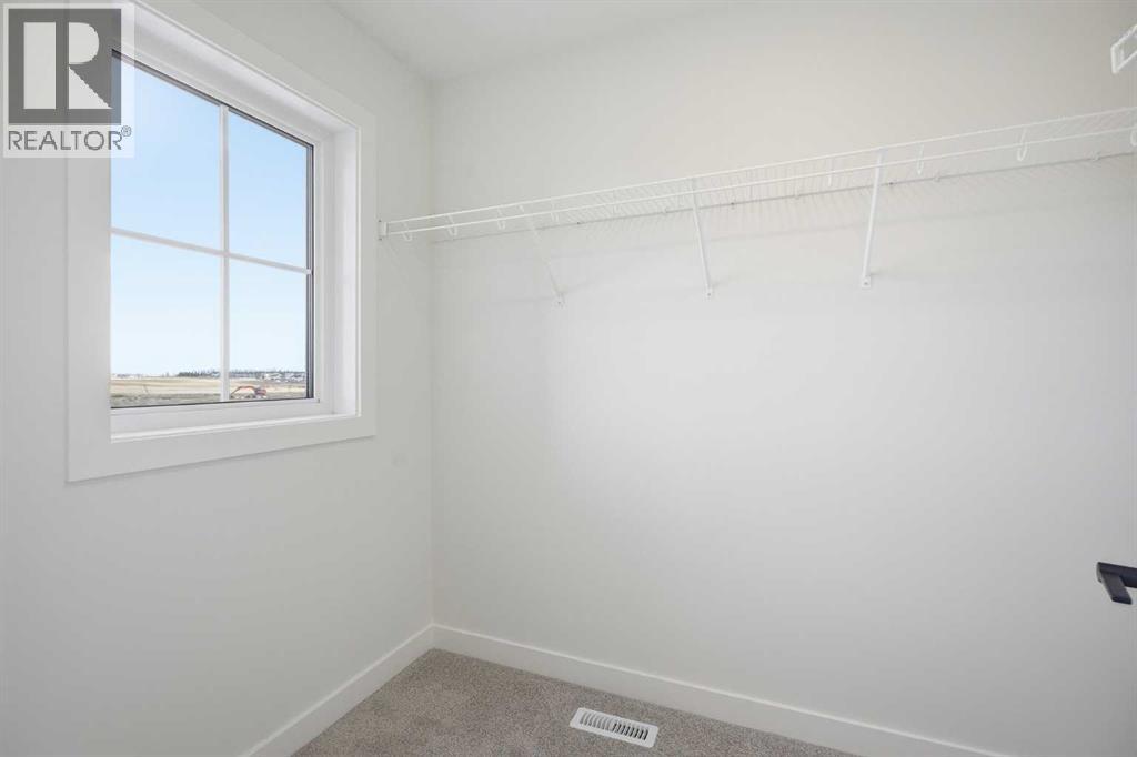 201 Bridgeport Gate, Chestermere, Alberta  T1X 3E2 - Photo 29 - A2304307