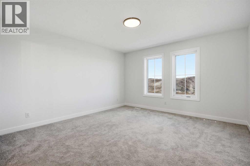 201 Bridgeport Gate, Chestermere, Alberta  T1X 3E2 - Photo 24 - A2304307