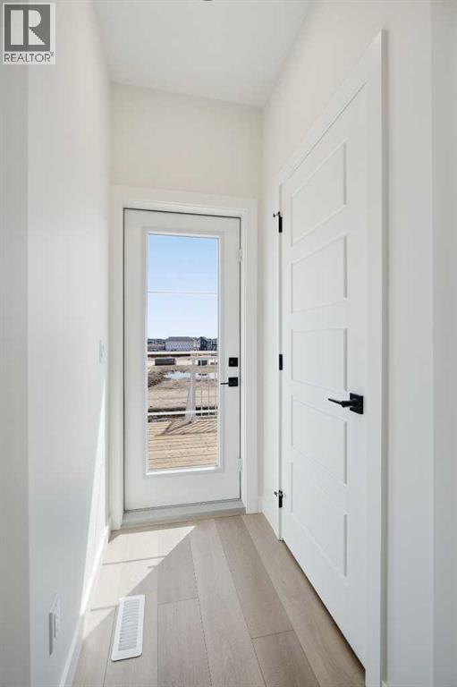 201 Bridgeport Gate, Chestermere, Alberta  T1X 3E2 - Photo 19 - A2304307