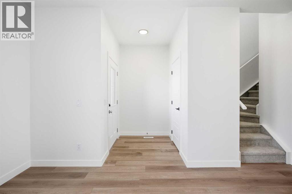 201 Bridgeport Gate, Chestermere, Alberta  T1X 3E2 - Photo 3 - A2304307