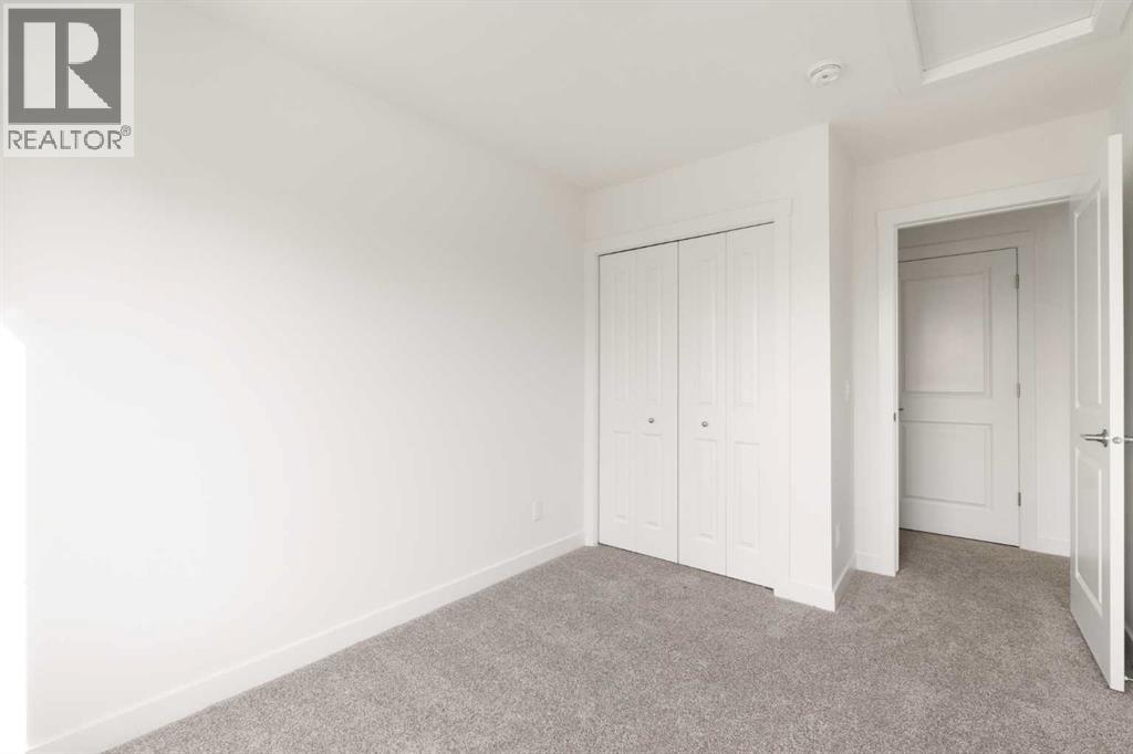 304, 255 Rowmont Boulevard Nw, Calgary, Alberta  T3L 0M2 - Photo 29 - A2307455