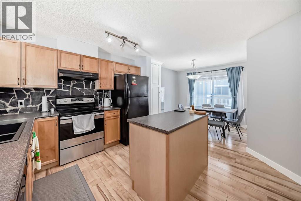 107 Tuscany Court NW, Calgary, Alberta  T3L 2Y9 - Photo 8 - A2311913