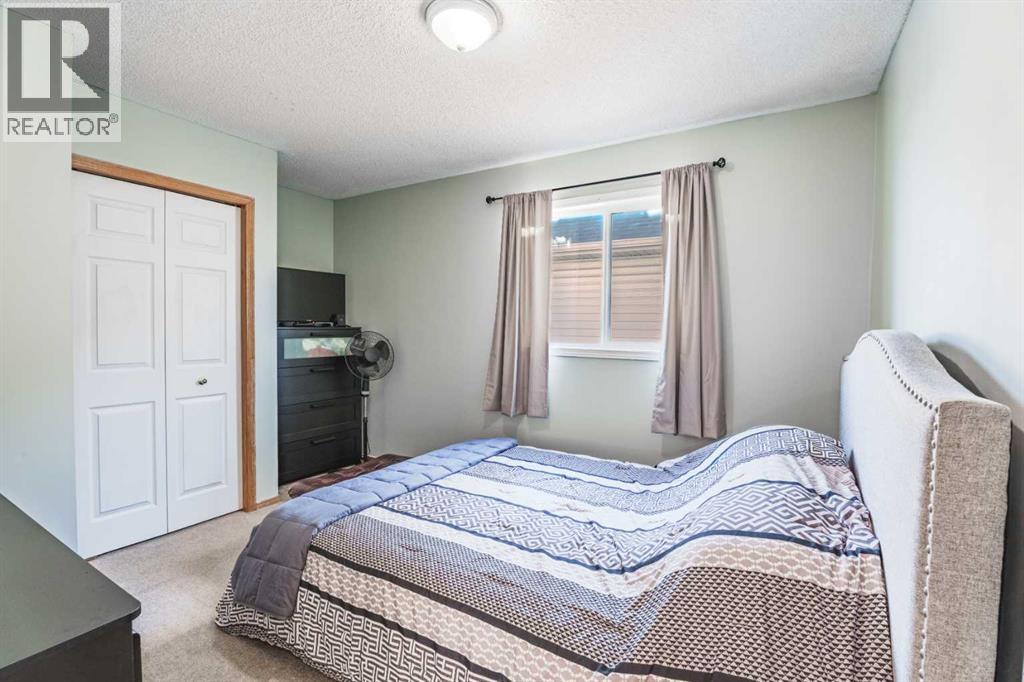 68 Bridleridge Gardens SW, Calgary, Alberta  T2Y 4C9 - Photo 16 - A2306132