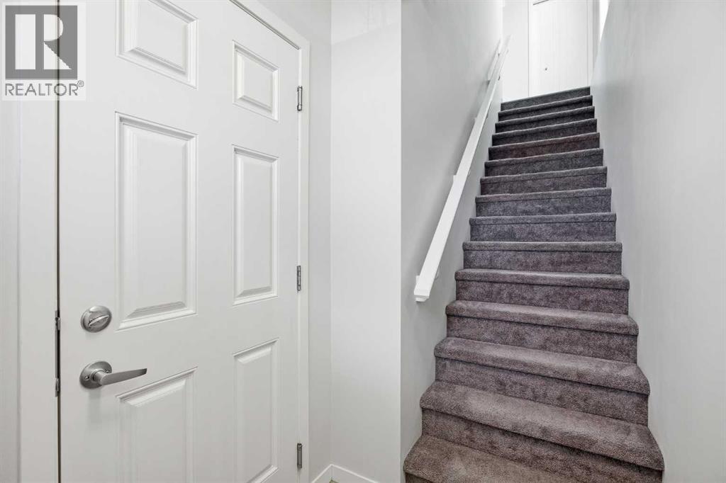 101 New Brighton Walk SE, Calgary, Alberta  T2Z 5C7 - Photo 3 - A2306336