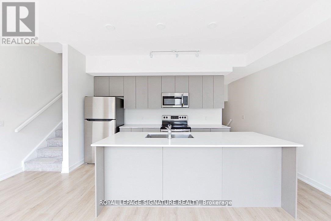 335 - 3078 Sixth Line, Oakville, Ontario  L6M 1P8 - Photo 2 - W13142466