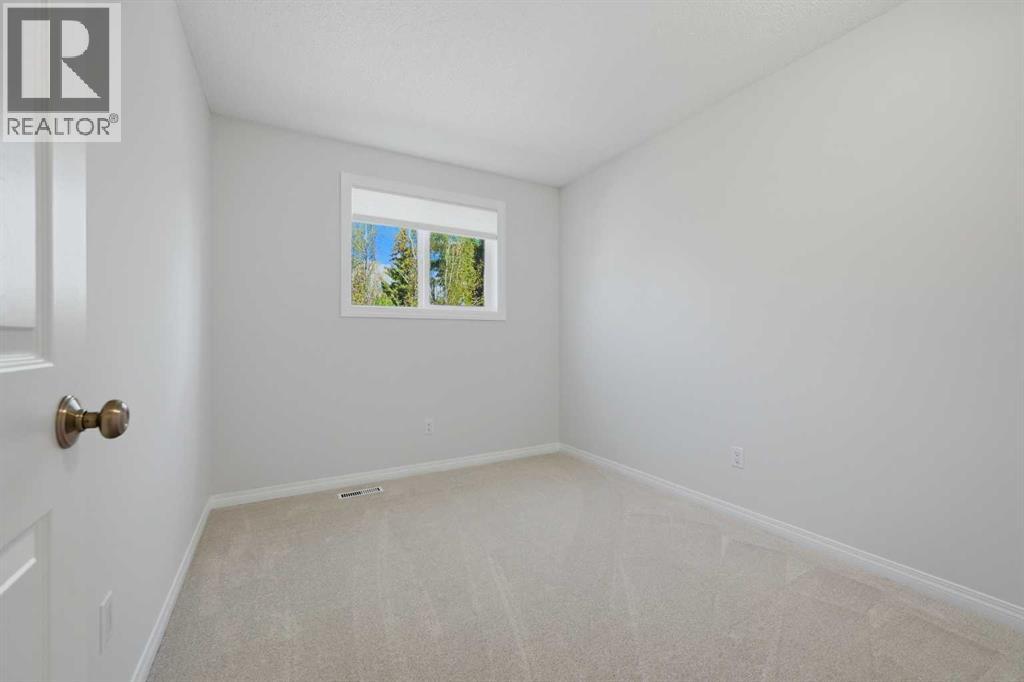 4 Woodstock Road Sw, Calgary, Alberta  T2W 5V8 - Photo 25 - A2312247