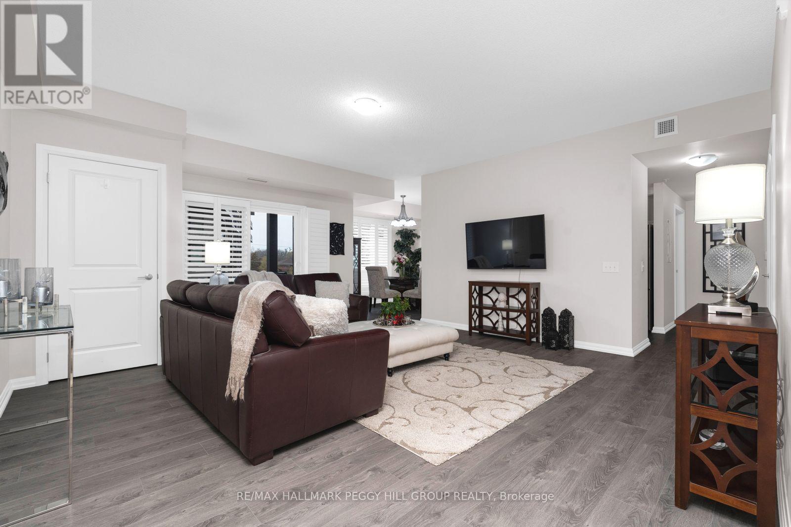 201 - 302 Essa Road, Barrie (0 West), Ontario  L9J 0H3 - Photo 2 - S13142600
