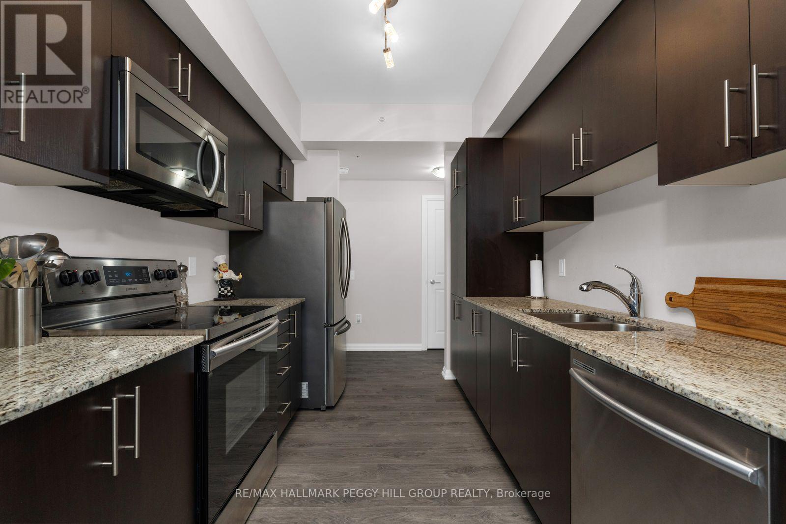 201 - 302 Essa Road, Barrie (0 West), Ontario  L9J 0H3 - Photo 4 - S13142600