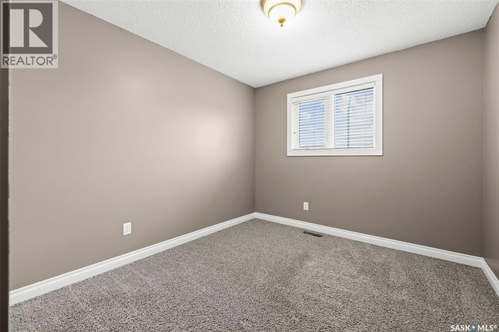 1015 Kenderdine Drive N, Regina, Saskatchewan  S4X 4H8 - Photo 15 - SK036266