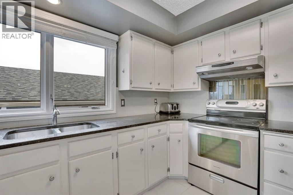 436 Huntley Way NE, Calgary, Alberta  T2K 4Z8 - Photo 13 - A2305488