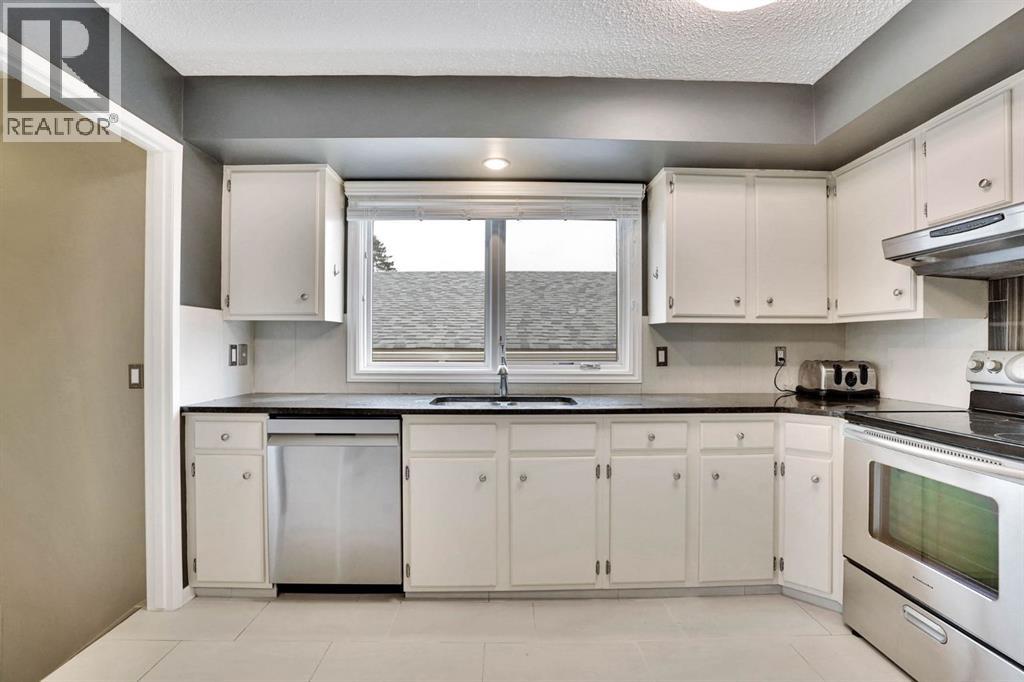 436 Huntley Way NE, Calgary, Alberta  T2K 4Z8 - Photo 12 - A2305488