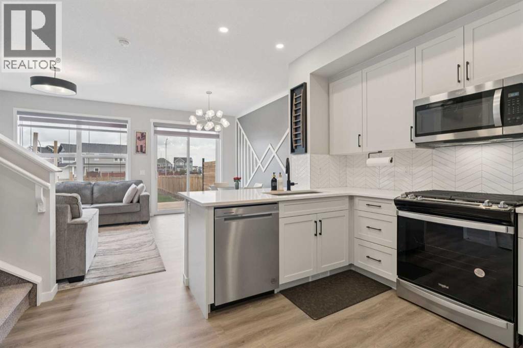 79 Magnolia Heath SE, Calgary, Alberta  T3M 2Z7 - Photo 4 - A2307903