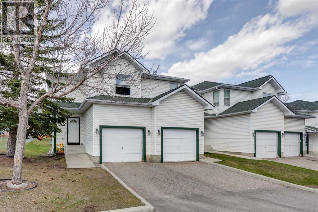 33 Sandpiper Lane NW, Calgary, Alberta  T3K 4L7 - Photo 1 - A2308260