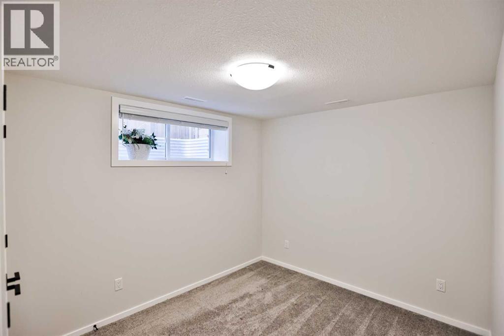 1109 Pacific Circle W, Lethbridge, Alberta  T1J 5V5 - Photo 24 - A2310728
