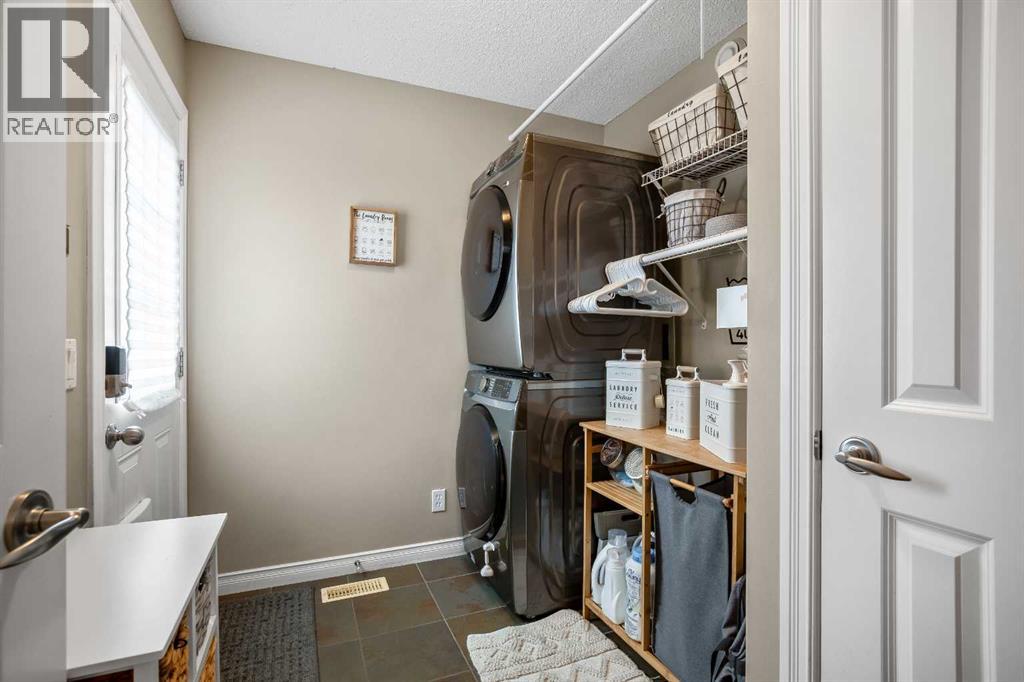 221 Drake Landing Lane, Okotoks, Alberta  T1S 2M4 - Photo 12 - A2310263