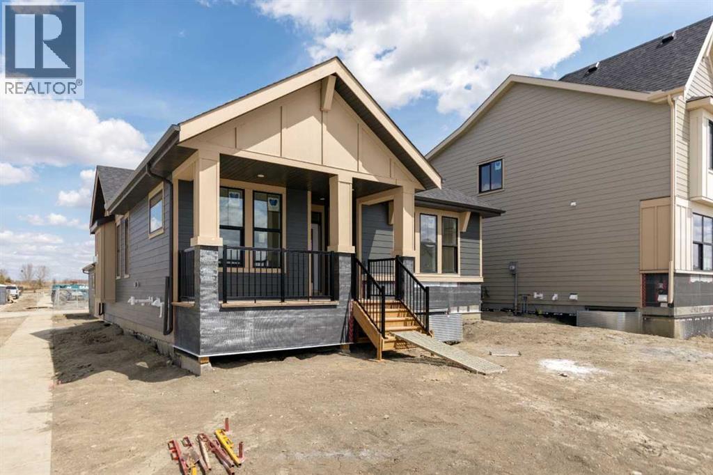 246 Harmony Circle, Rural Rocky View County, Alberta  T3Z 0K9 - Photo 3 - A2306464