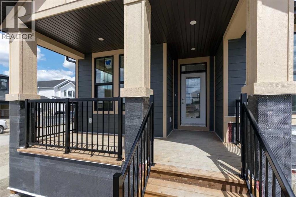 246 Harmony Circle, Rural Rocky View County, Alberta  T3Z 0K9 - Photo 6 - A2306464