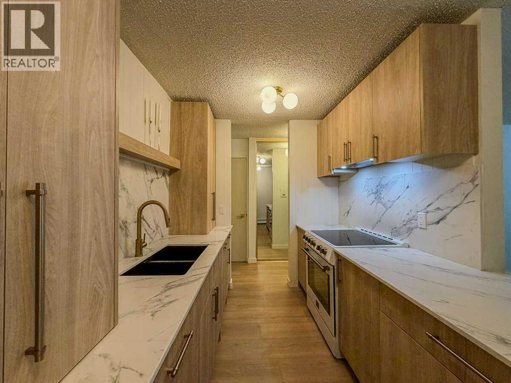 2106, 4001b 49 Street Nw, Calgary, Alberta  T3A 2C9 - Photo 5 - A2311904