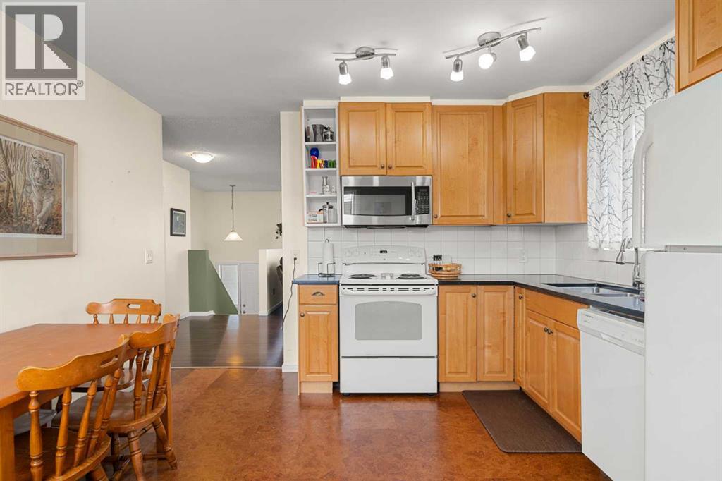 75 Bedford Drive NE, Calgary, Alberta  T3K 2N9 - Photo 7 - A2312183