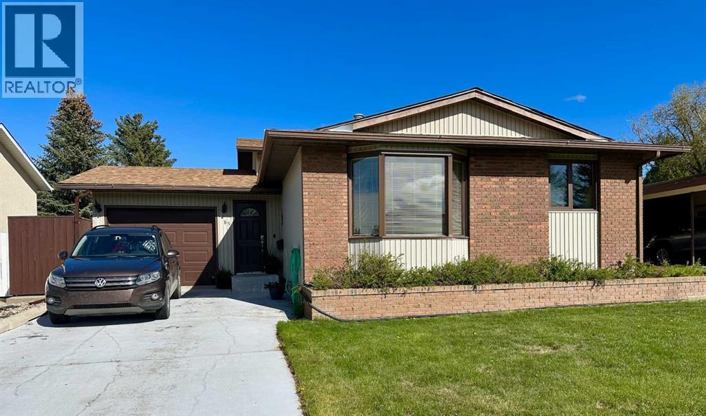 85 Cayuga Crescent W, Lethbridge, Alberta  T1K 5H4 - Photo 1 - A2312494