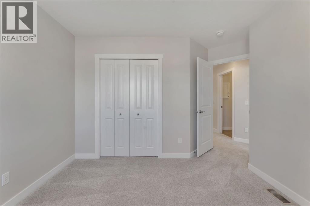11 Fireside Common, Cochrane, Alberta  T4C 3E1 - Photo 36 - A2291699