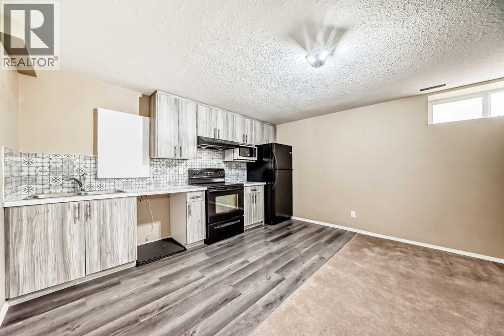 2128 Luxstone Boulevard Sw, Airdrie, Alberta  T4B 0C6 - Photo 30 - A2303539
