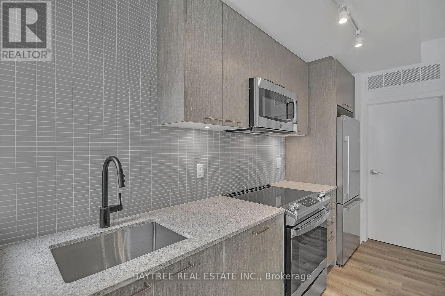 Th4 - 30 Ed Clark Gardens, Toronto, Ontario  M6N 0B5 - Photo 6 - W13144778