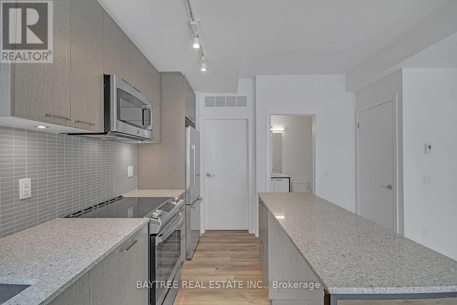 Th4 - 30 Ed Clark Gardens, Toronto, Ontario  M6N 0B5 - Photo 7 - W13144778